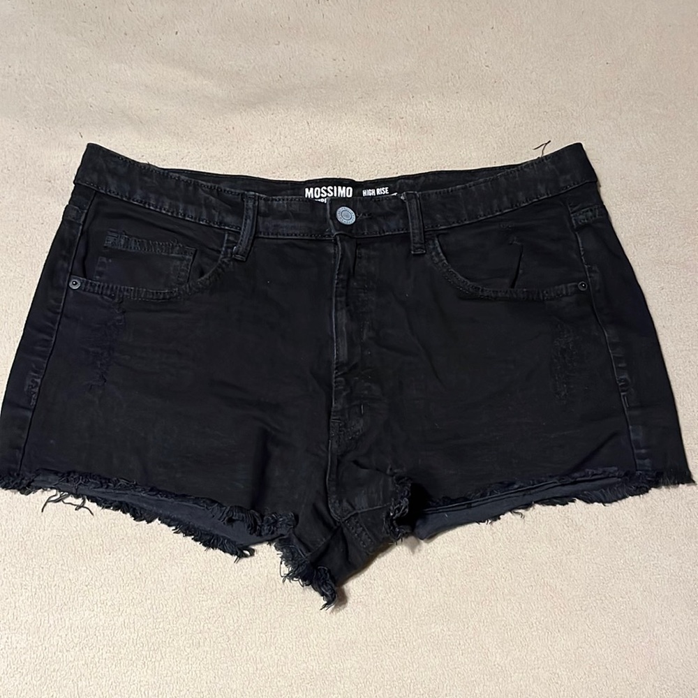 Black distressed denim shorts.
